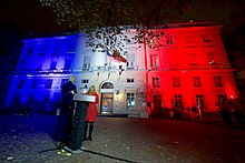 U.S. Embassy, Paris was illuminated in French flag to show solidarity after the attacks. Secretary Kerry, Ambassador Hartley Host Ceremony to Light U.S. Embassy in French Tricolor Following Terrorist Attack on City (23045979086).jpg
