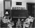 The La Roe family of Austis, Fla., after a day's work for The Deland pool. Left is Mrs. La Roe, with her twe-year-old... - NARA - 196393.jpg