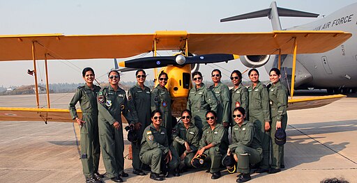 The women pilots of Indian Air Force in front of the IAF Tiger Moth vintage aircraft at Air Force Station Hindan, in Ghaziabad on November 24, 2015