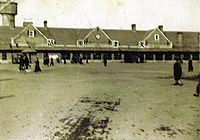 The main station building, waiting room and station square of the Tianjin East Station (Today's Tianjin Station) as of January 1948. Tianjin (East) railway station 1948.jpg
