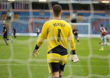 Heaton playing for Burnley in 2015 Tom Heaton watches proceedings.jpg