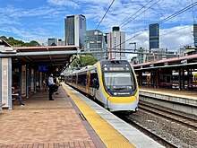 A Queensland Rail NGR train approaching Roma Street station Train approaching Roma Street railway station, Brisbane, 2021.jpg