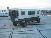 A mobile lounge at Washington Dulles International Airport TransportationWashingtonDullesAirport.jpg