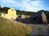 The farmhouse and ancillary buildings