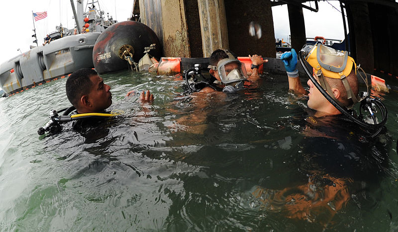 File:US Navy 100812-N-9769P-034 Navy Diver 2nd Class Jason Hatch briefs safety procedures to Panamanian divers prior to conducting pier searches during joint diving training aboard SNS Grasp (T-ARS 51).jpg