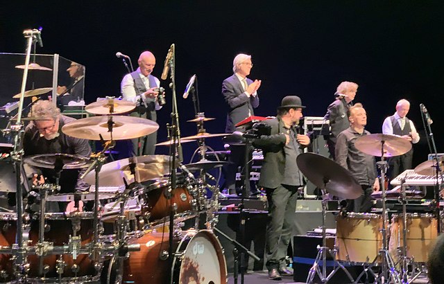 King Crimson at the Sapporo Culture Arts Theatre in Japan, on 2 December 2018. From left to right: Pat Mastelotto, Tony Levin, Bill Rieflin, Jeremy St