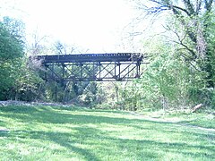 Abandoned trestle of the Cabin John trolley line over Foundry Branch from as seen from the intersection of Foxhall Road and Canal Road WGFTrestle.jpg