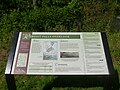 Detailed view of a sign at Wamesit Falls Overlook, located at the southern end of the Concord River Greenway near 1000 Lawrence Street, Lowell, Massachusetts. The plaque gives information about the surrounding area.