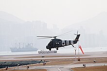 A 28 Squadron Wessex HC2 takes off at Hong Kong in 1983.