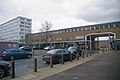 West Gate and West Walk, The High, Harlow - showing arch to service area.jpg
