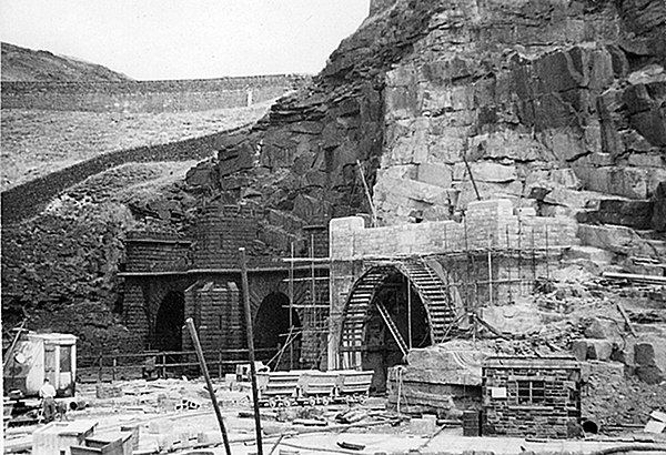 The western portals of Woodhead 1 & 2 in the background, with Woodhead 3 under construction in the foreground, 1953