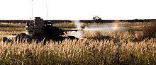 A Bradley Fighting Vehicle fires its 25mm main gun as part of D (Diablo) Troop's live fire exercise in Slovakia. 1-7 CAV holds CALFEX hosted by Slovakian Military.jpg