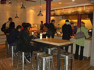 Customers dining and ordering at a New York City branch of Soul Daddy 5.2.11SoulDaddyOpeningDayByLuigiNovi7.jpg