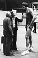A Körcsarnokban Forró Tamás riporter beszélget egy szovjet kosárlabdással. Fortepan 56263.jpg