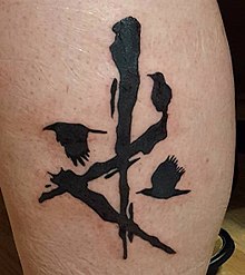 A fan tattoo of American Murder Song's The Mark with crows