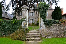 The priory from the garden Abbatiale de Saint-Philbert-de-Grand-Lieu (prieure 2).jpg