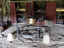 Castell Henllys, a reconstruction of an Iron Age Celtic roundhouse showing the hearth and a cooking pot (photo by Ceridwen). Bed and breakfast in the Iron Age - geograph.org.uk - 1474053.jpg