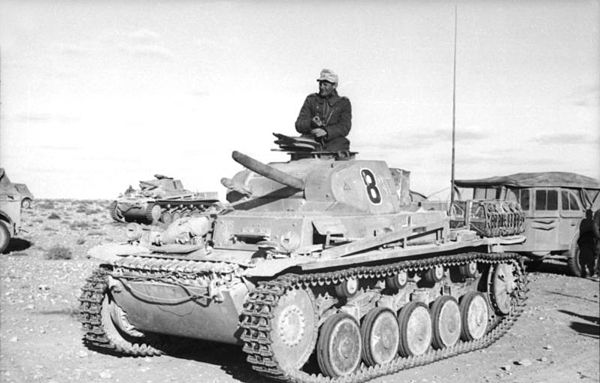 A Panzer II of the 15th Panzer Division. Note the faded insignia on the front, left of the handle and just below the turret.