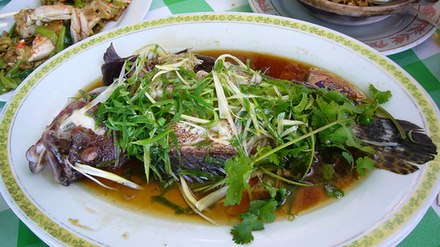 Cantonese cuisine, steamed fish, seasoned with soy sauce, coriander and Welsh onion