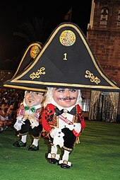 The Dance of the Dwarves is one of the most important acts of the Lustral Festivities of the Bajada de la Virgen de las Nieves in Santa Cruz de La Palma. Danza de Enanos 2015 PMBV.jpg