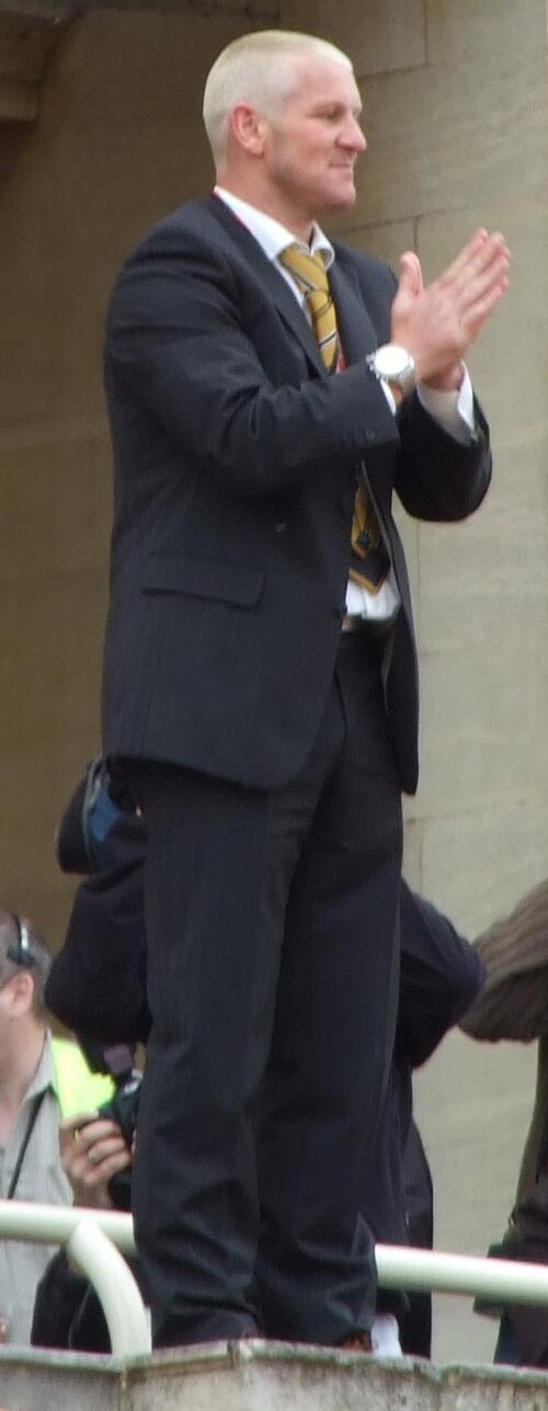 Windass celebrates on the balcony of Hull City Hall after scoring the goal that sent the city's team into the top flight of English football for the f