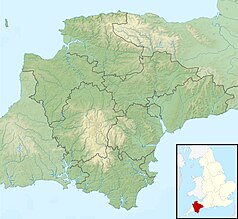 Mapa konturowa Devonu, na dole znajduje się czarny trójkącik z opisem „Butterdon Hill”