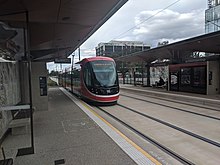 Dickson Interchange in November 2019 Dickson Interchange light rail stop looking north, November 2019.jpg