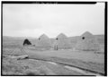 Distant view from west of four kilns - Piedmont Charcoal Kilns, Fort Bridger vicinity, Piedmont, Uinta County, WY HABS WYO,21-PIED,1-1.tif