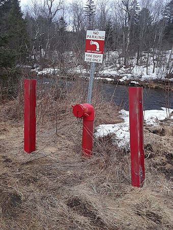 A dry hydrant by Passumpsic River in rural Vermont