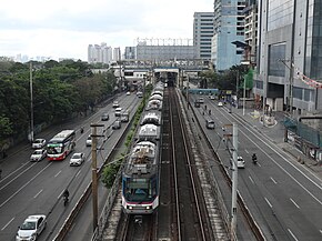 EDSA with MRT train, near Kamuning Station (Quezon City; 03-21-2021).jpg