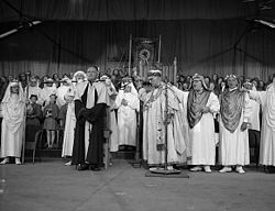 The chairing ceremony of the 1958 National Eisteddfod; the victorious poet was T. Llew Jones Eisteddfod Genedlaethol Cymru, Glynebwy, 1958.jpg