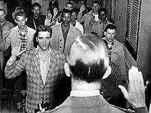 Presley being sworn into the Army on March 24, 1958 at Fort Chaffee Elvis sworn into army 1958.jpg