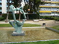 Català: Enginyeria tèxtil. Pl. Ferran Casablancas (Barcelona). Escultor: Àngel Ferrant. Material: bronze (original de pedra artificial rosada). 1961, reconstruïda en bronze 1999. This is a photo of public art indexed in the cataloge Art Públic of Barcelona (Spain) under the code number 5003-1 (prefixed with territorial id: 08019/5003-1) Object location 41° 24′ 05.04″ N, 2° 07′ 58.87″ E  View all coordinates using: OpenStreetMap