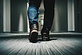 Feet in a hotel corridor (Unsplash).jpg