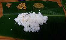 Serving food on a banana leaf is a popular tradition in certain parts of India, Sri Lanka, and parts of Southeast Asia. Food served on Banana Leaf.jpg