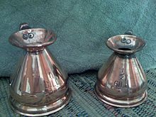 Copper measuring jugs of 1 and
1/2 gill Gill-photo.jpg