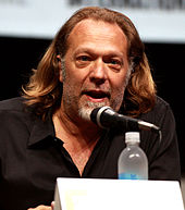 Greg Nicotero (pictured) collaborated with KNB Efx Group to produce the well sequence. Greg Nicotero by Gage Skidmore.jpg