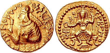 Kushan ruler Huvishka with seated Roman-Egyptian god Serapis (ϹΑΡΑΠΟ, "Sarapo") wearing the modius.[24]