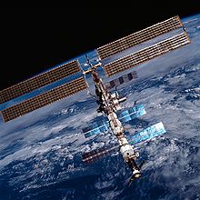 The International Space Station during its construction in Earth orbit in 2001. It must be periodically re-boosted to maintain its orbit ISS on 20 August 2001.jpg