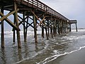 A long fishing pier for residents of the beach condo...