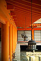 Lanterns hang from the eaves of a building