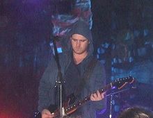 Jesse Lacey performing at the Starland Ballroom in June 2006. Jesse Lacey in 2006.jpg