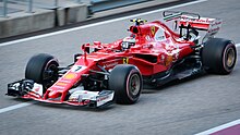 F1 driver Kimi Raikkonen with Ferrari in 2017 season Kimi Raikkonen 2017 United States GP (37946720226).jpg