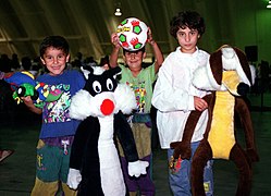 Kurdish children proudly show off some of their new founded American friends. Toys have been generously donated from numerous organization affiliated with military bases and civilia - DPLA - 0a6066b2832aeffa0f8f0c88612313f7.jpeg