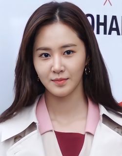 Yuri wearing red and white outfit in February 2019