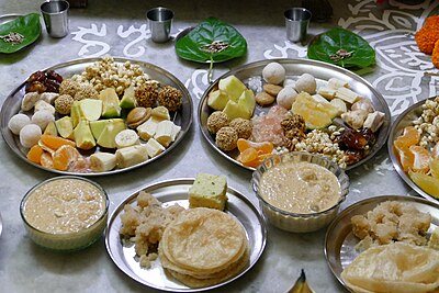 Prasad offered during Puja ceremony at a home in West Bengal, India