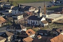 Linden (BE) – Village centre with the church from the north (view from Aebersold)