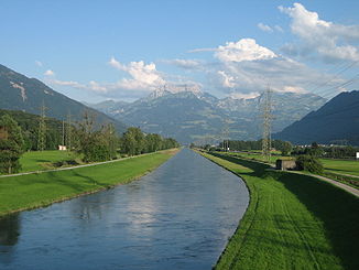 The Linth Canal near Reichenburg, heading south, with the Mürtschenstock in the background.