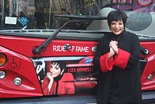 Liza Minnelli, the subject of the album's lead single, in 2011 Liza Minnelli @ Legend and New York Icon, Liza Minnelli, Honored in Gray Line New York's "Ride of Fame".jpg