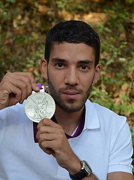 Махидин с серебряной медалью Олимпийских игр 2012 года